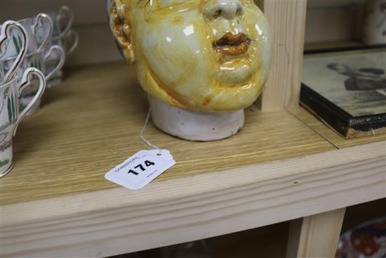 A faience / delft Chinese head